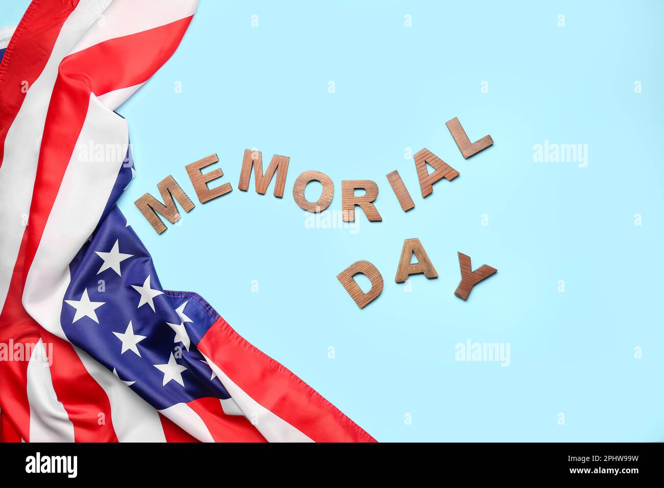 Text MEMORIAL DAY with USA flag on blue background Stock Photo - Alamy