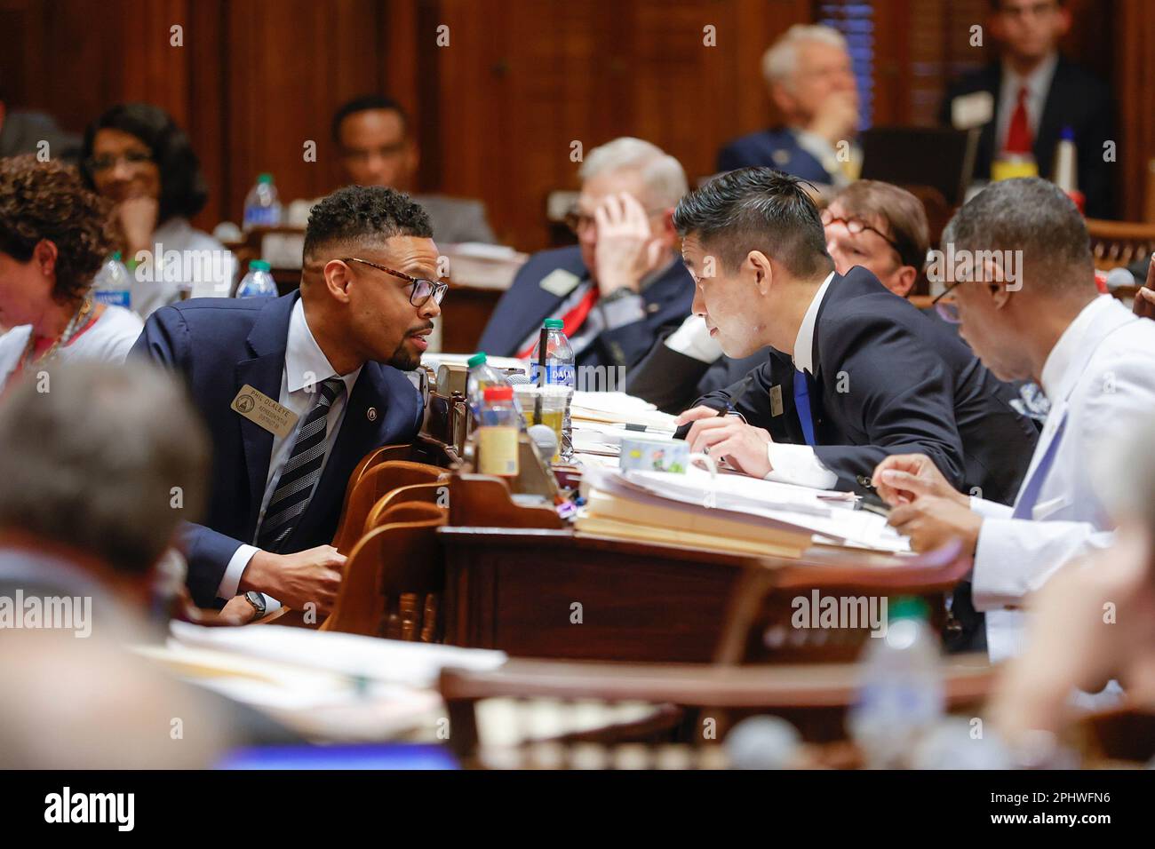 Rep. Phil Olaleye, DAtlanta, left, and Rep. Sam Park, DLawrenceville