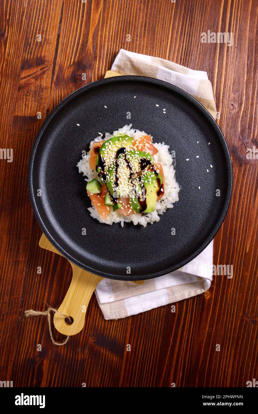Sushi waffles are crispy rice cooked in a waffle iron with salmon