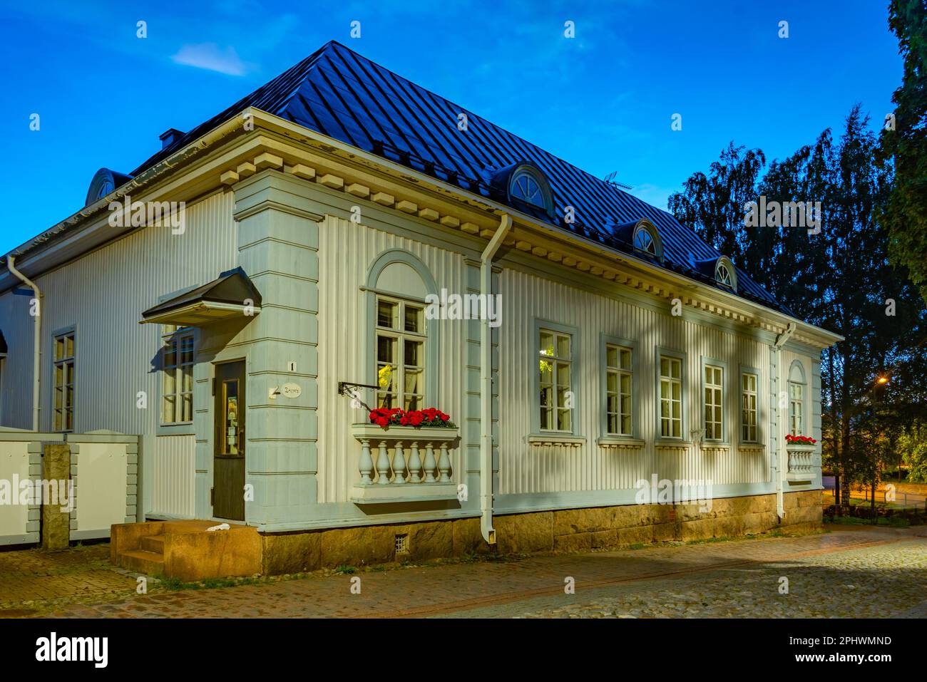 Sunset view of timber buildings at Vanha Rauma district of Rauma in Finland. Stock Photo