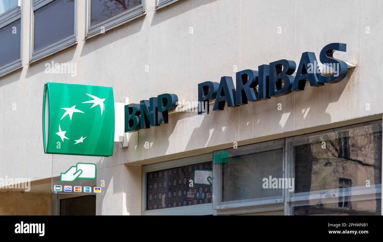 Paris, France March 29, 2023 BNP Paribas bank sign and logo outside a bank branch indicating