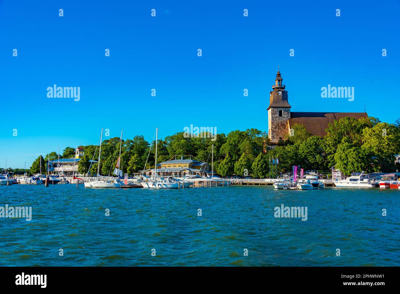 Naantali Naantali church viewed over marina in Finland Stock Photo - Alamy