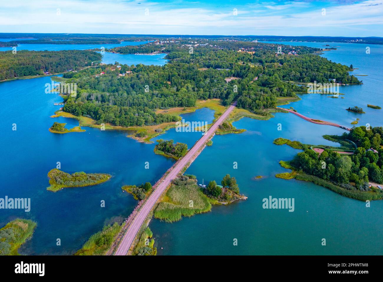 Road connecting remote islands at Aland archipelago in Finland. Stock Photo
