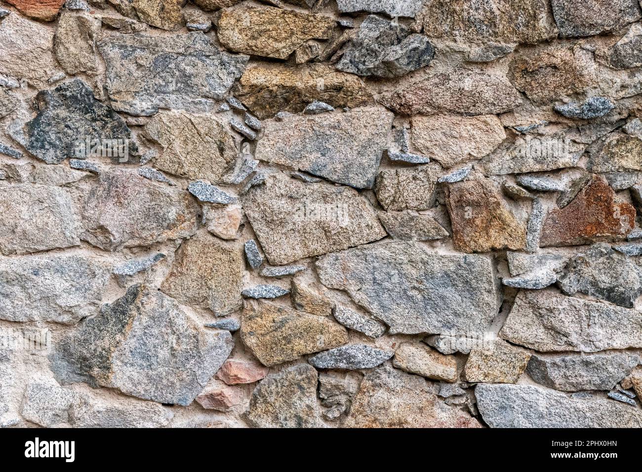 The surface of the ancient masonry of natural stones. Israel Stock