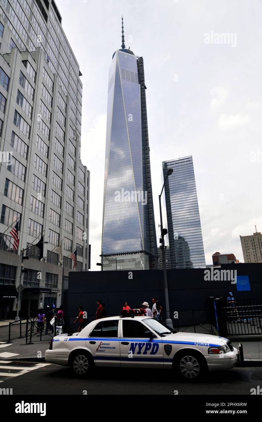 A NYPD car with the WTC complex in Lower Manhattan, New York City, NY