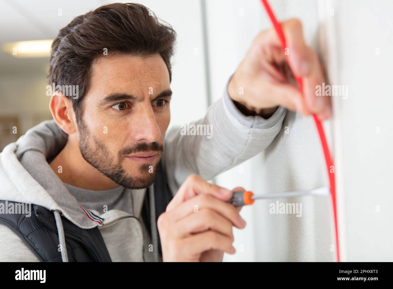 electrician engineer tests electrical installations Stock Photo Alamy