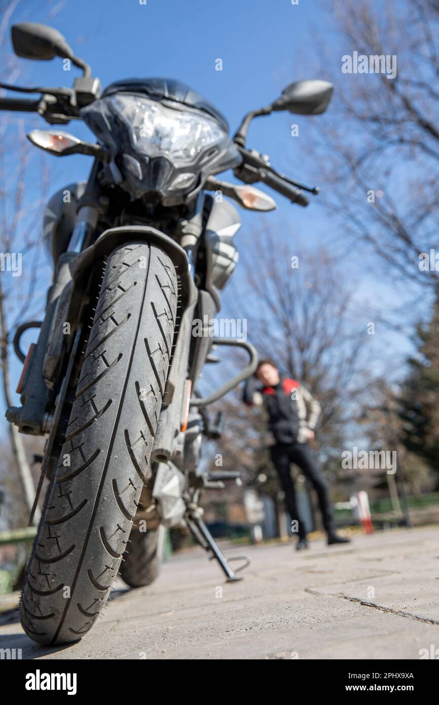 biker and motorbike ready to ride Stock Photo