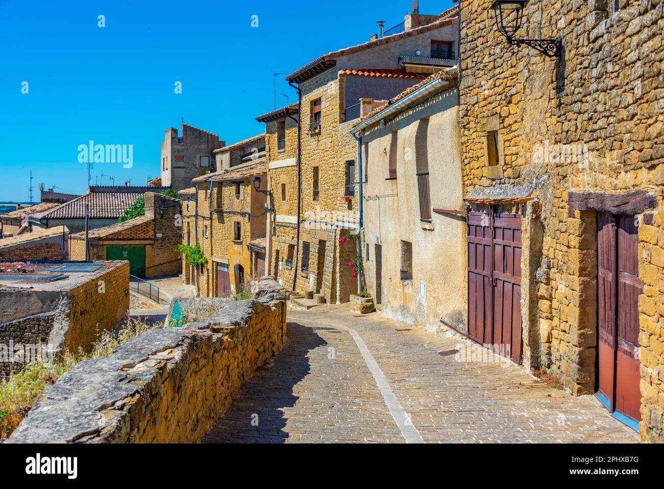 Medieval street in Spanish village Ujue. Stock Photo