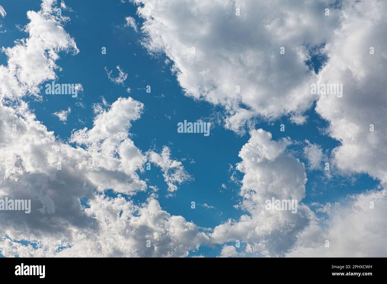 Spring blue sky with many clouds Stock Photo