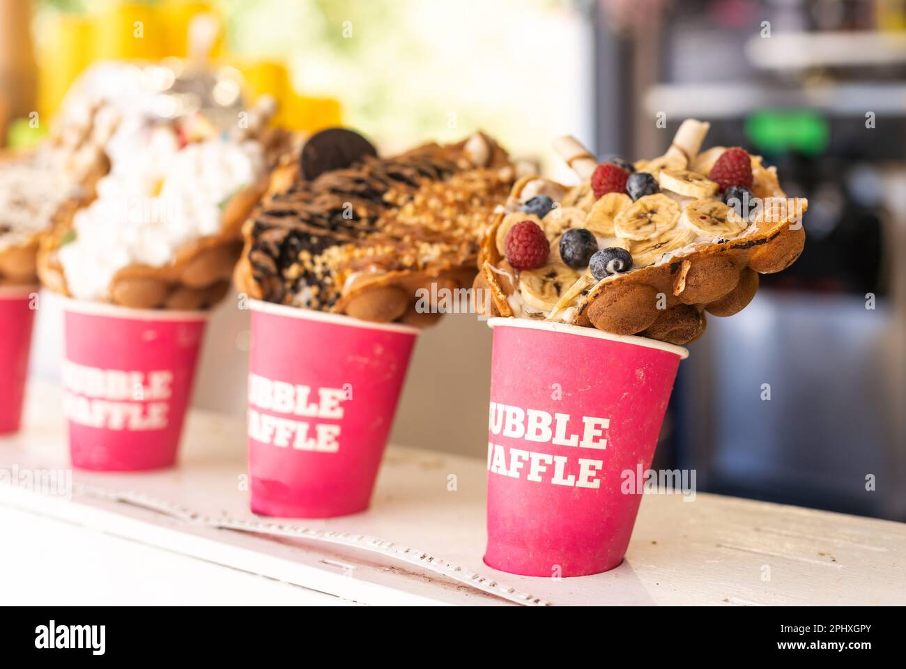 Different types of bubble waffle ice cream to go Stock Photo Alamy