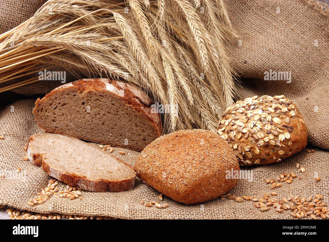 bread and rolls with wheat ears Stock Photo