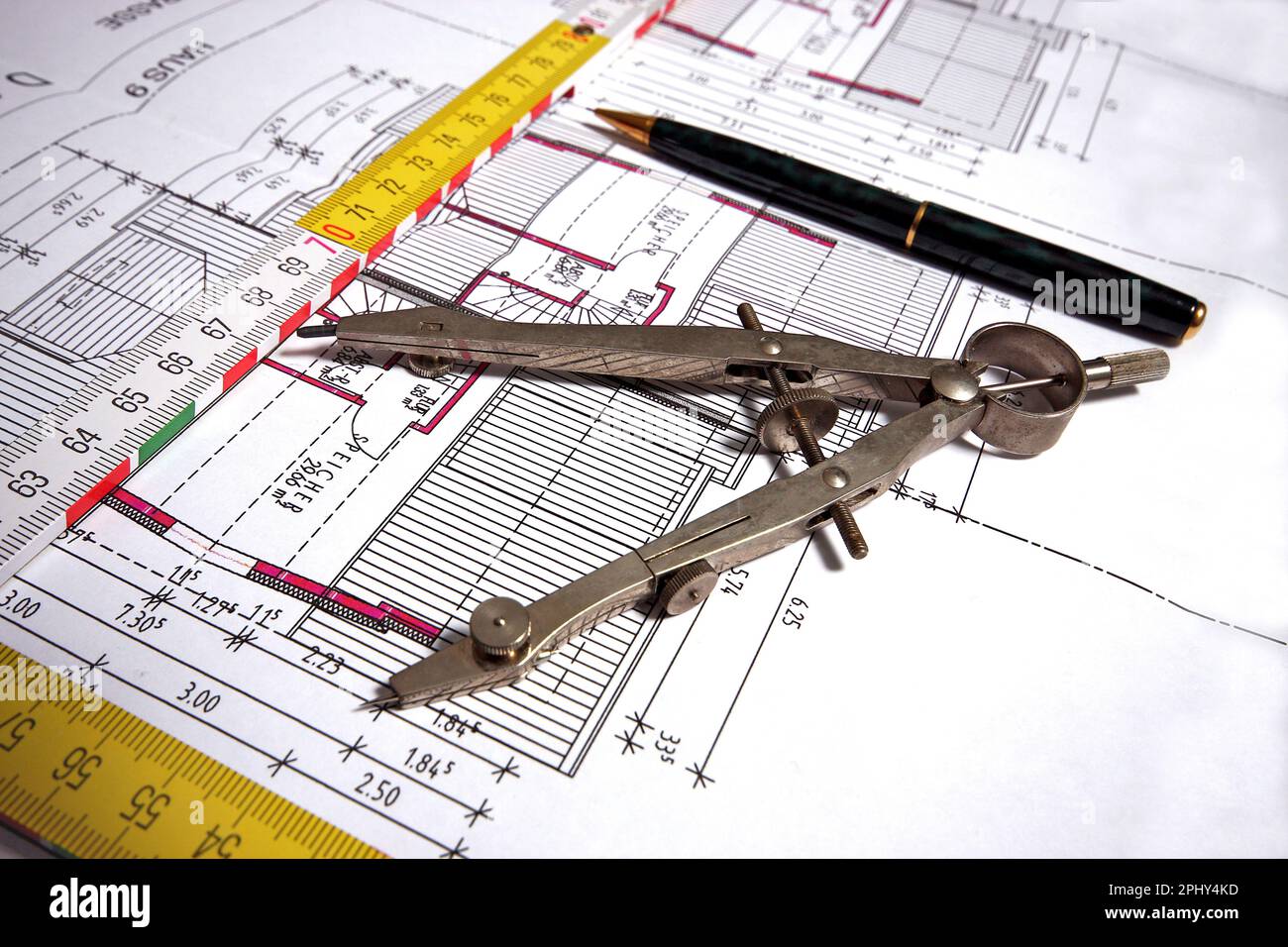 architectural drawing with folding rule, pencil and compass Stock Photo