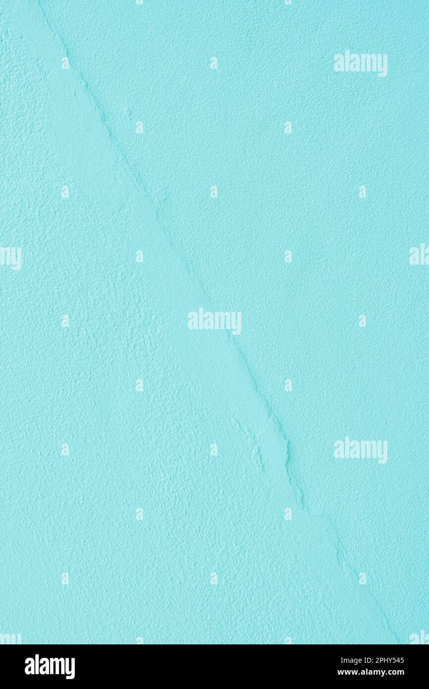 Light blue green white abstract background. Toned rough concrete wall surface. Stock Photo