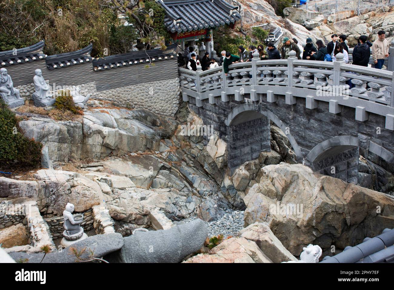 Buddha and deity angel statue in wishing pond for korean people