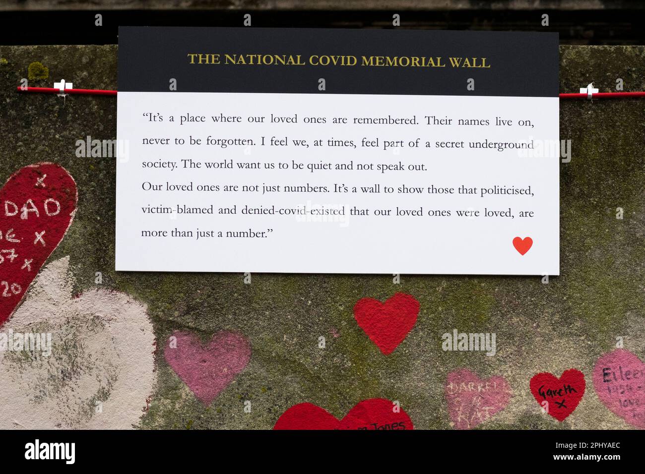 Temporary plaque using a quote from someone bereaved at the second year anniversary commemoration of the National COVID Memorial Wall. Stock Photo