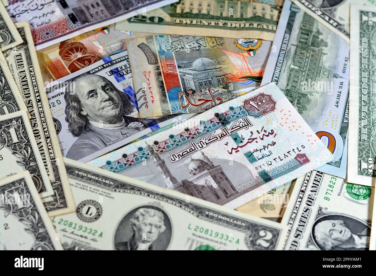 Egyptian Pounds Currency With American USA Dollars Cash Money Banknotes egyptian-pounds-currency-with-american-usa-dollars-cash-money-banknotes