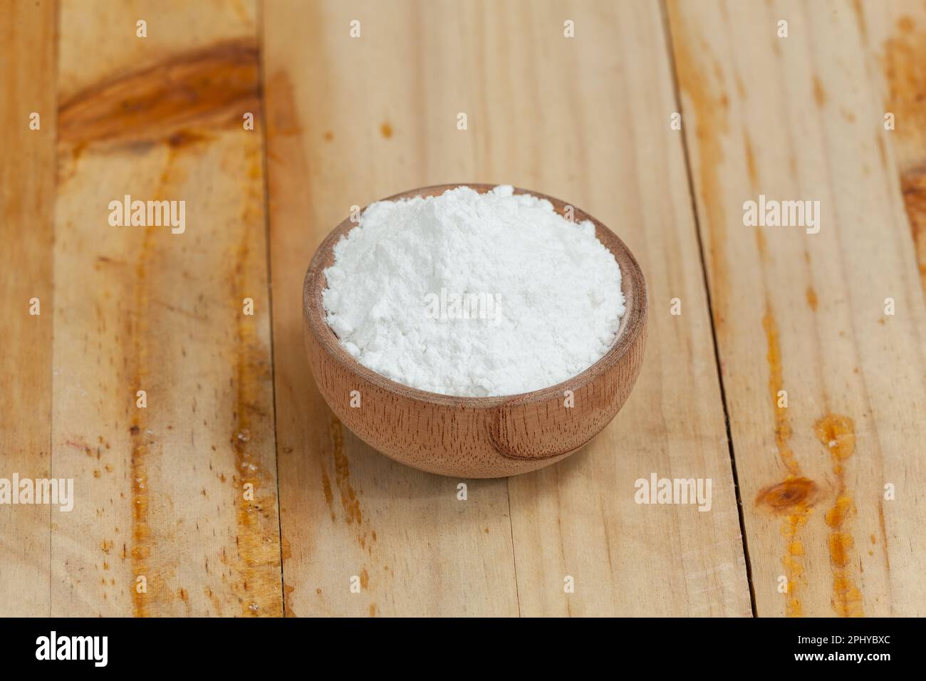Baking Soda Wooden Bowl With Sodium Bicarbonate, On Wooden Background