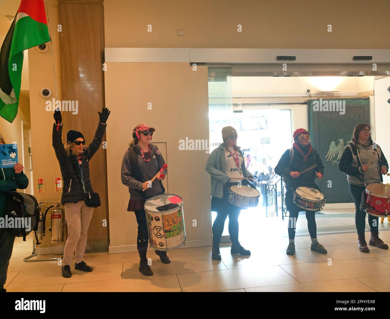 In a Barclays bank in Brighton a protest in support of Palestine takes place Stock Photo