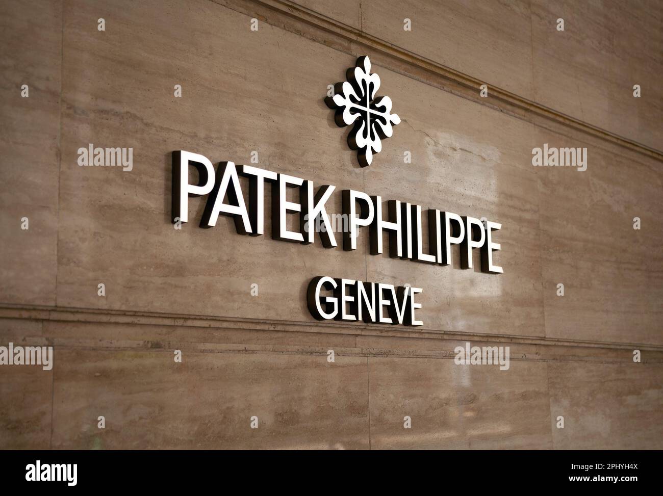 Ho Chi Minh City, Vietnam - March 28, 2023: Watch and clock store commercial sign with black and white Patek Philippe Geneve logo. Famous Swiss luxury Stock Photo