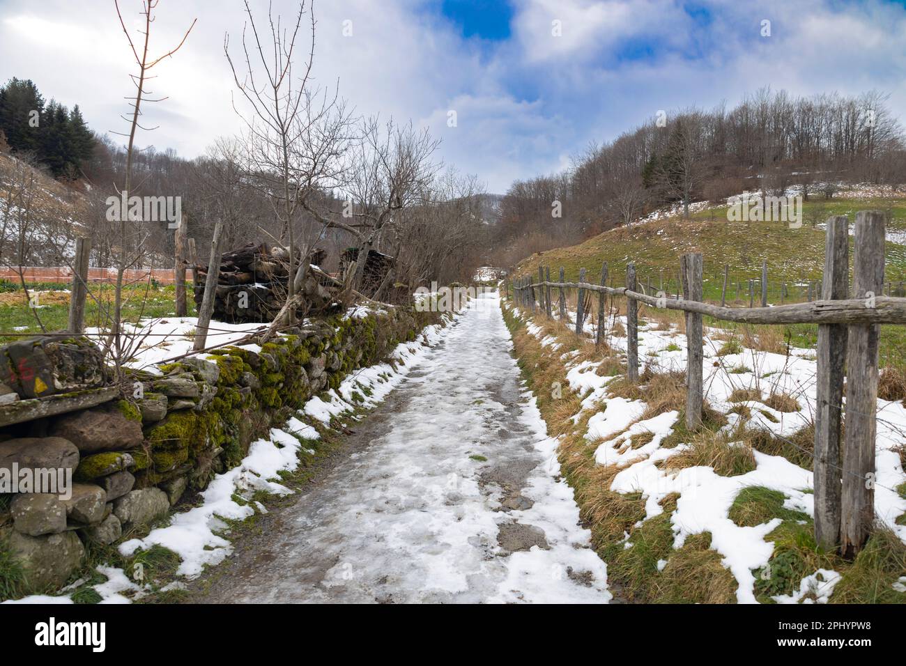 Frozen country path near the municipality of Ventarola, province of Genoa, Italy Stock Photo