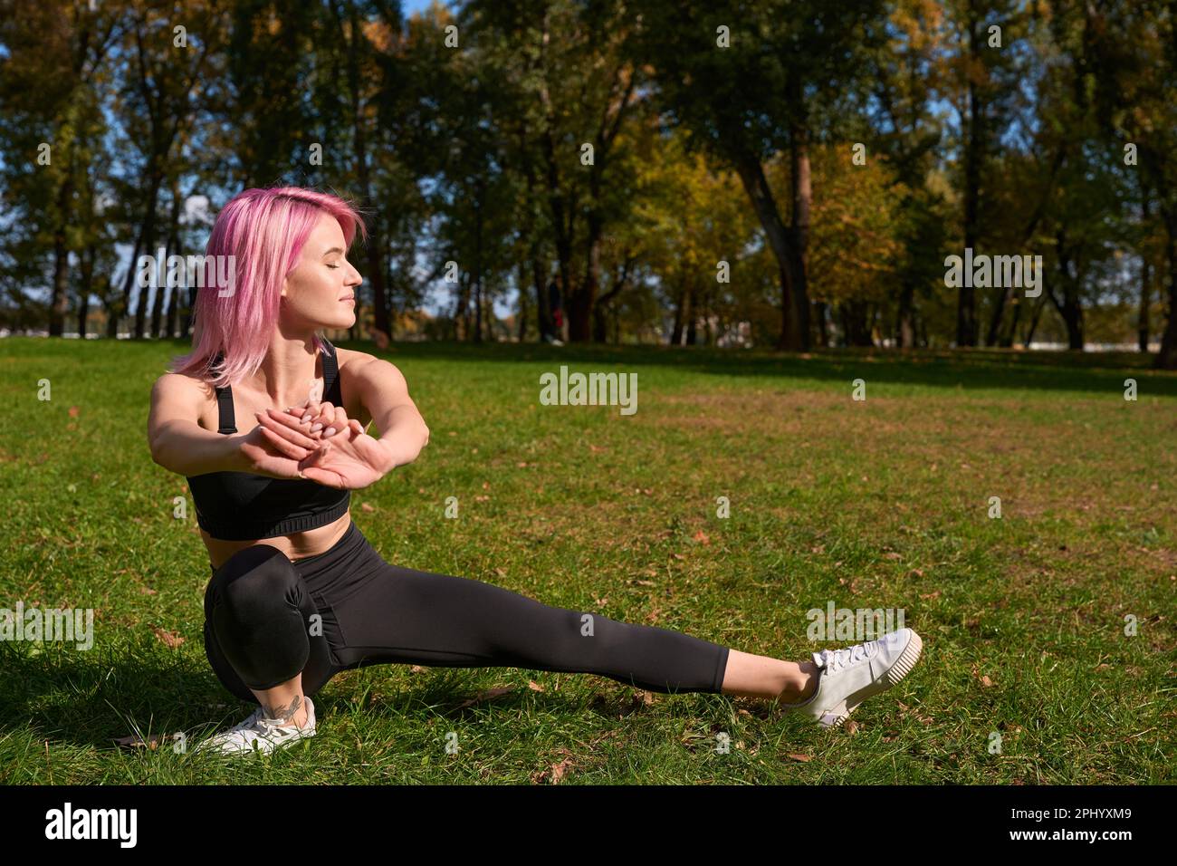 Yogi stretching leg outdoors hi-res stock photography and images - Alamy