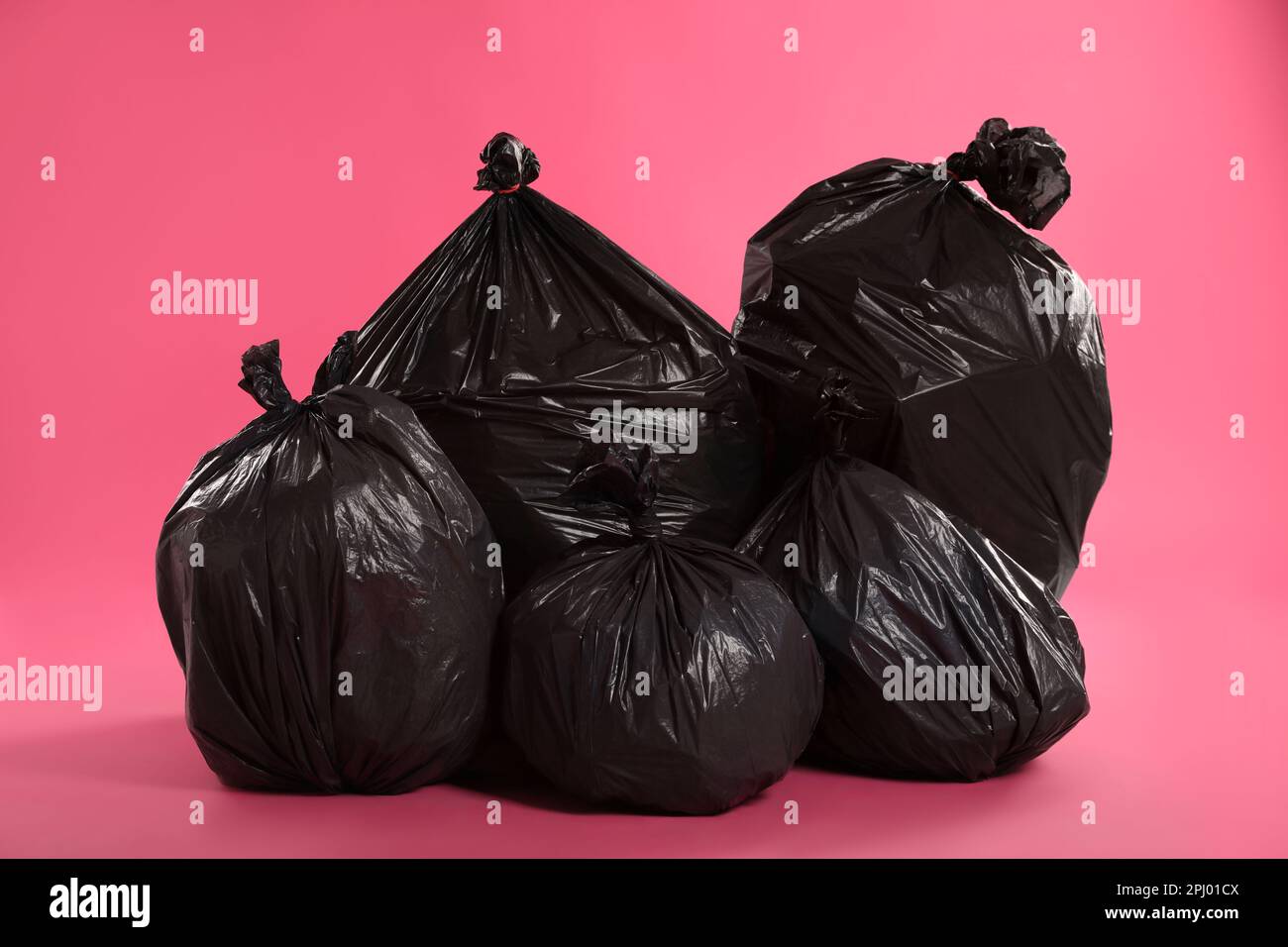 Pink rubbish bags hi-res stock photography and images - Alamy