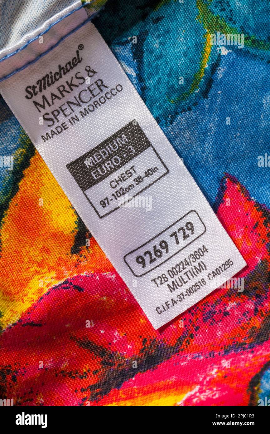 label in St Michael from Marks & Spencer man's colourful colorful cotton shirt size M medium made in Morocco Stock Photo