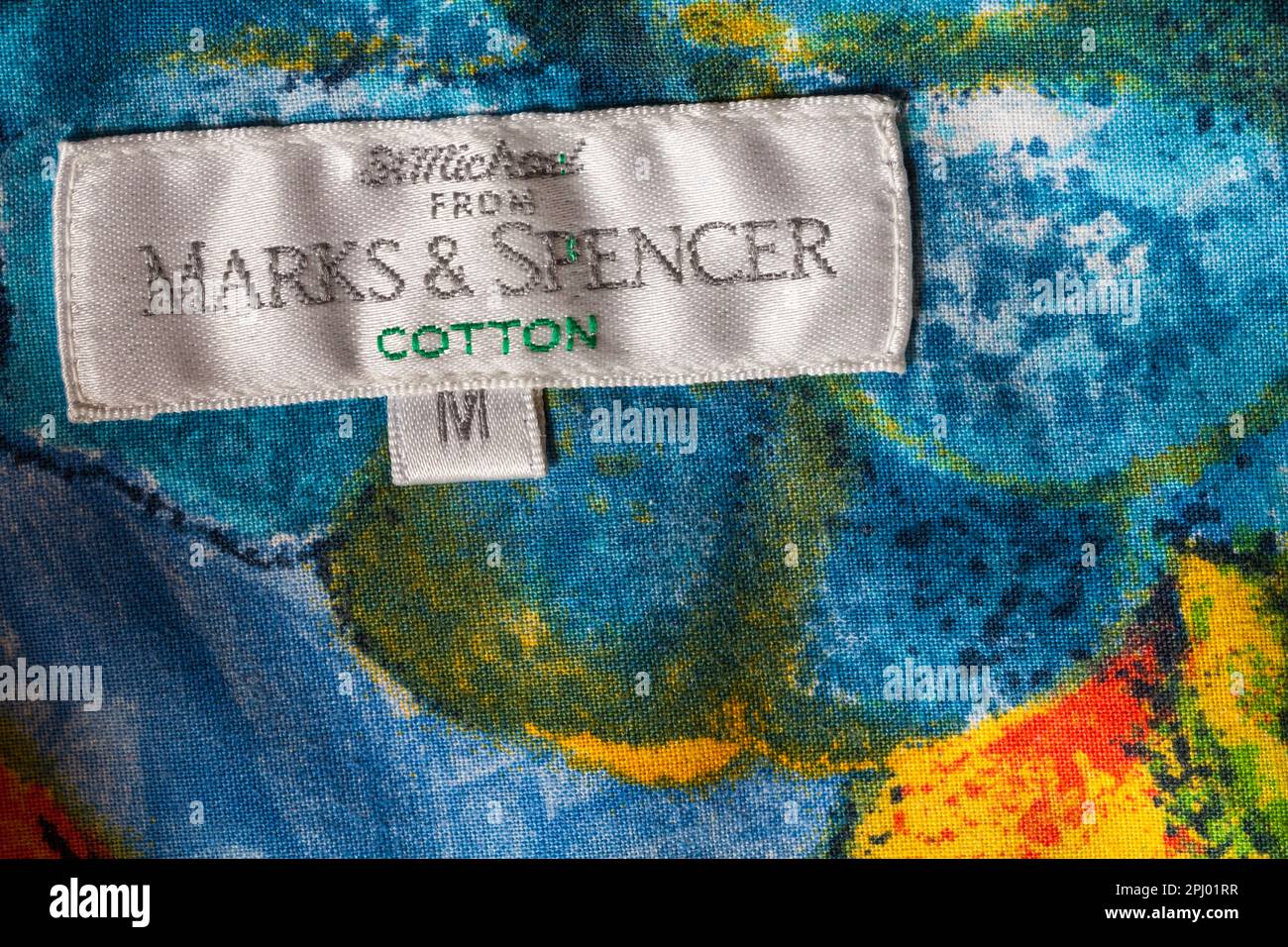 label in St Michael from Marks & Spencer man's colourful colorful cotton shirt size M medium Stock Photo