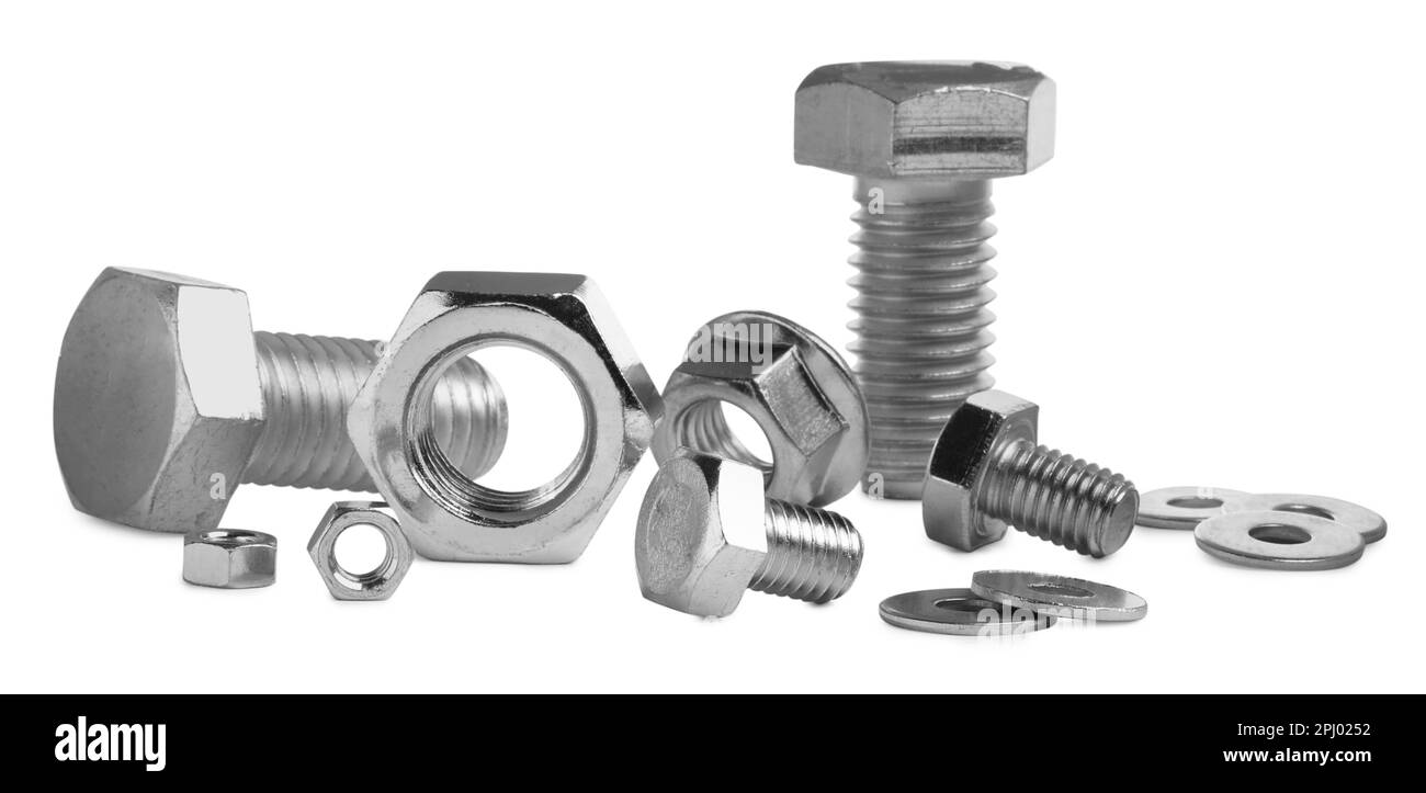 Different metal bolts and nuts on white background Stock Photo Alamy