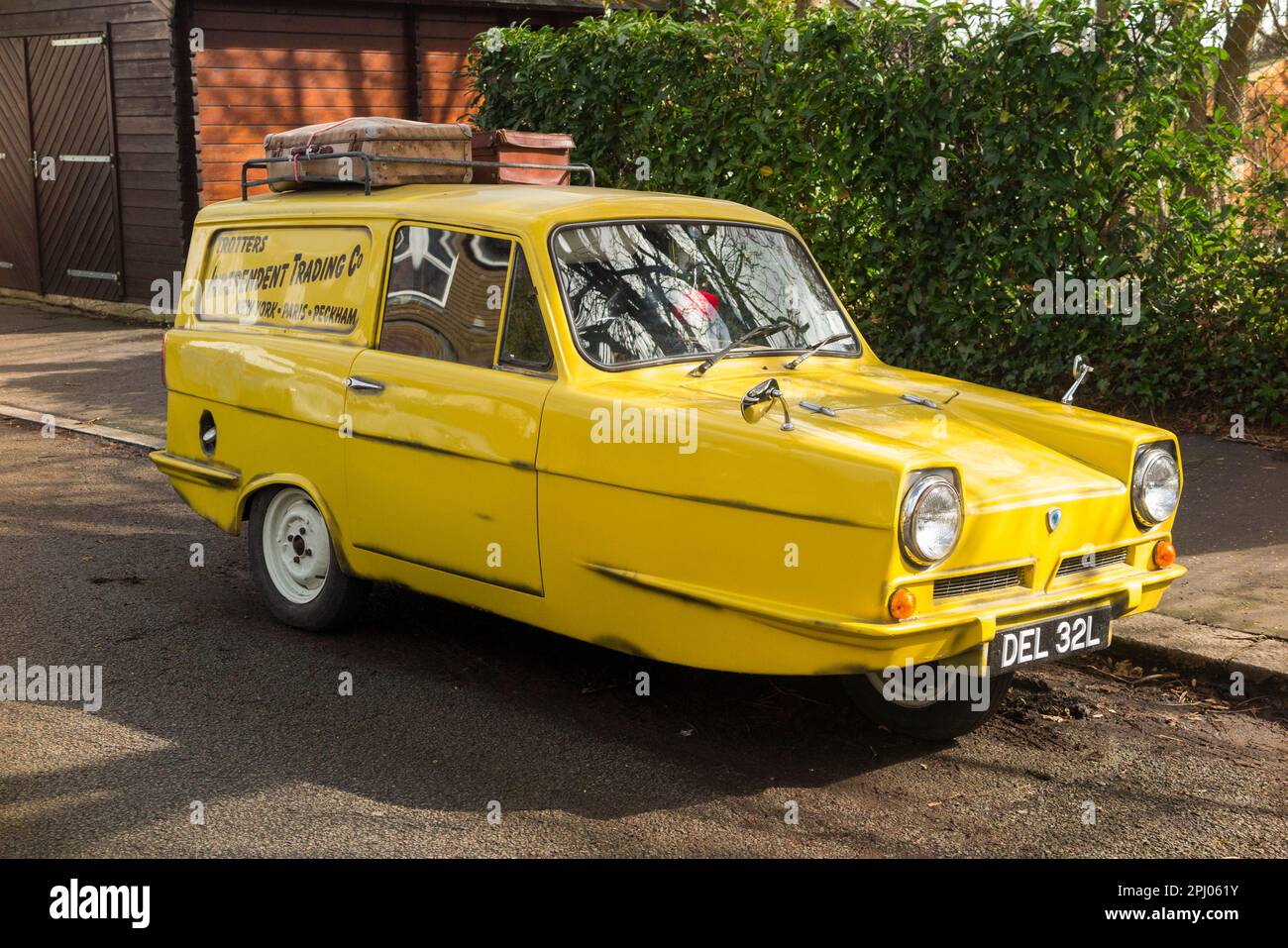 Tribute classic car 'copy' of Del Boy's Reliant Regal (1968 model in the TV series) yellow van from Only Fools and Horses television programme. (133) Stock Photo