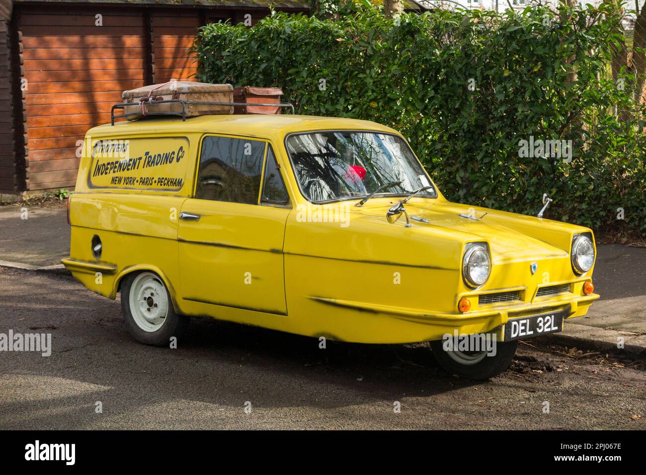 Tribute classic car 'copy' of Del Boy's Reliant Regal (1968 model in the TV series) yellow van from Only Fools and Horses television programme. (133) Stock Photo