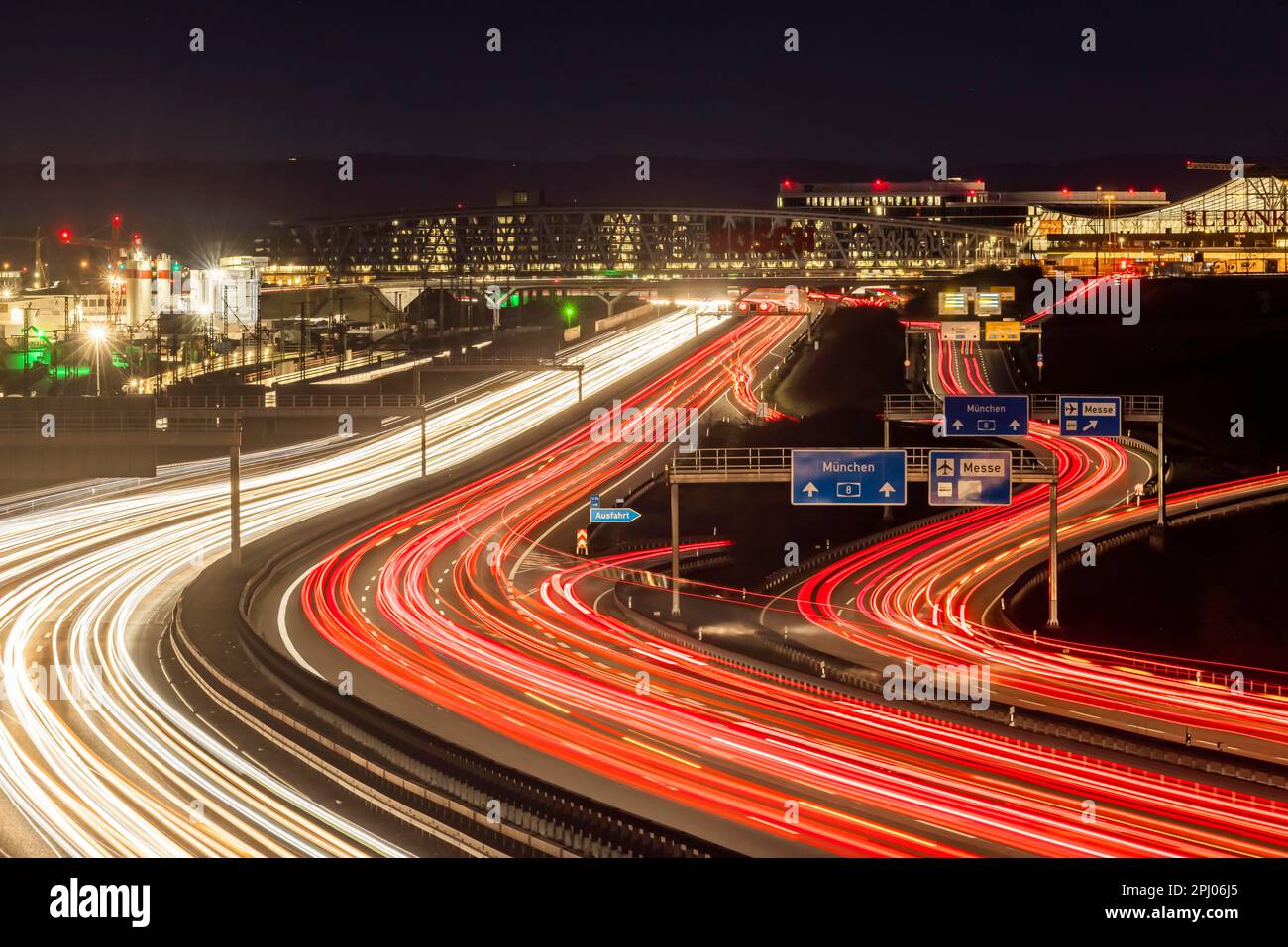 A8 motorway at the airport, the Bosch multi-storey car park spans the road. On the right the Stuttgart Trade Fair Centre, on the left the Stock Photo