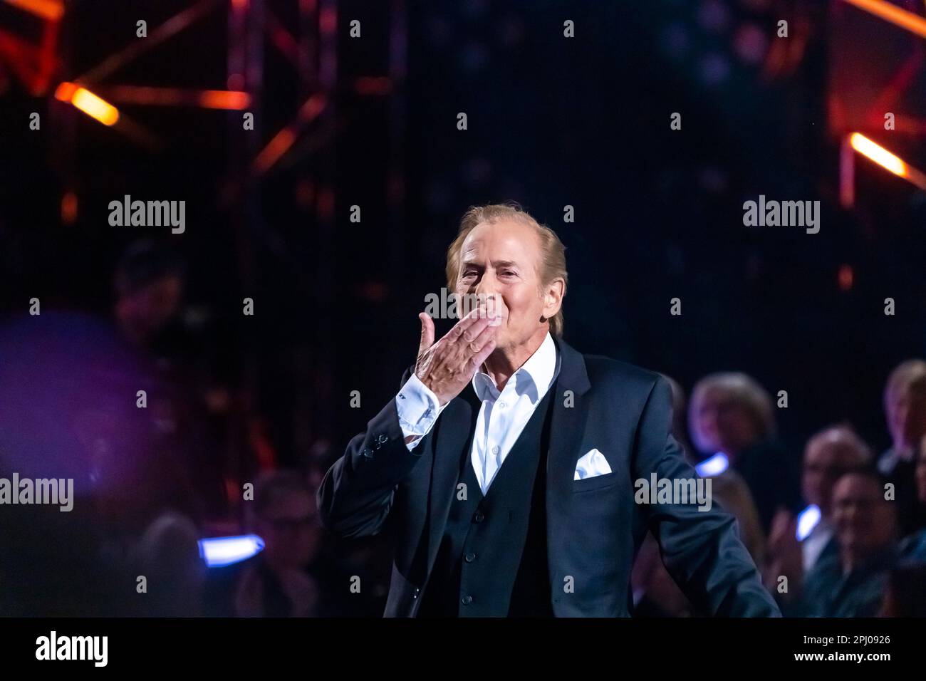 Singer Michael Holm performing on stage. 50 years of ZDF Hitparade, anniversary show of the TV classic with hit songs and hit parade artists Stock Photo