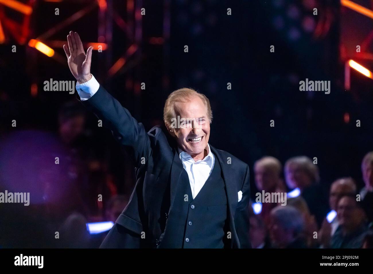 Singer Michael Holm performing on stage. 50 years of ZDF Hitparade, anniversary show of the TV classic with hit songs and hit parade artists Stock Photo
