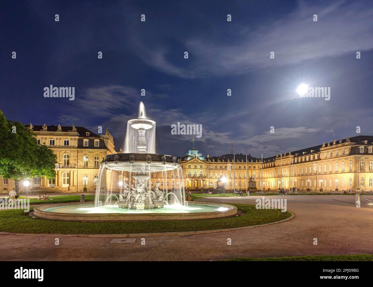 New Palace with evening lighting, fountain on the Palace Square, four ...