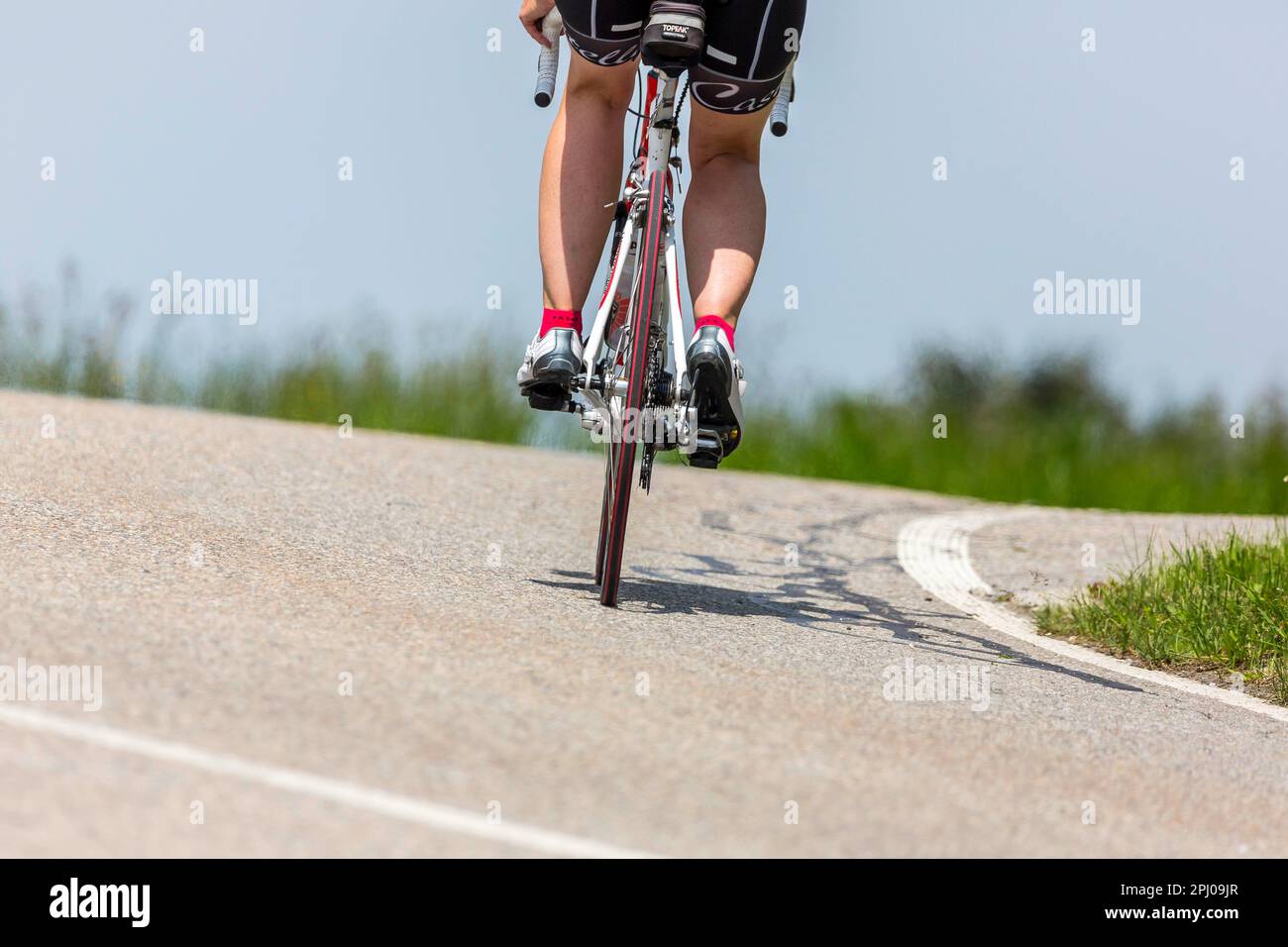 Cyclist with racing bike in the idyllic Lautertal, Muensingen, Baden-Wuerttemberg, Germany Stock Photo