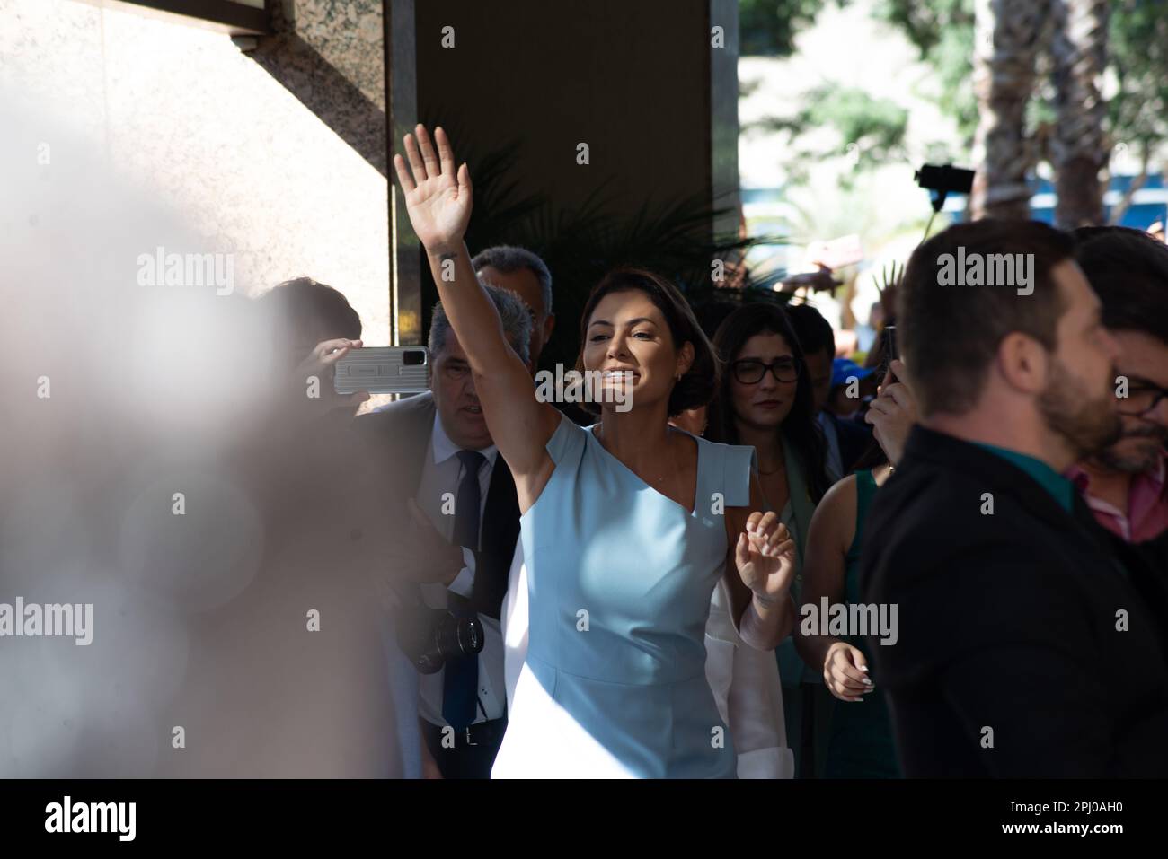 Brasilia, Brazil. 30th Mar, 2023. Michelle Bolsonaro, former first lady of Brazil, waves to supporters of her husband. After three months in the U.S., the ex-president has returned to Brazil. Contrary to expectations, the 68-year-old was not greeted by thousands of supporters, but only by one group. Credit: Matheus Alves/dpa/Alamy Live News Stock Photo