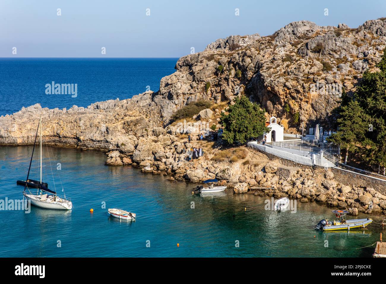 St Pauls Bay in Lindos with Chapel, Rhodes, Greece Stock Photo