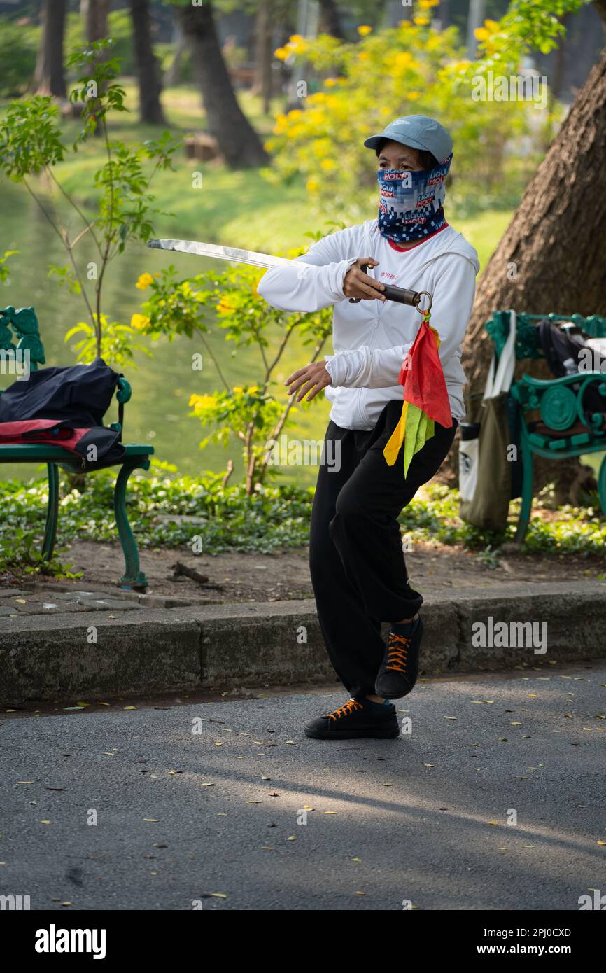 Tai Chi martial arts exercise in Lumphini Park a large green space with
