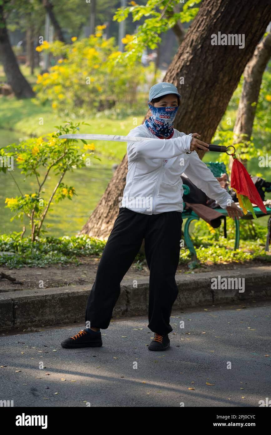 Tai Chi martial arts exercise in Lumphini Park a large green space with
