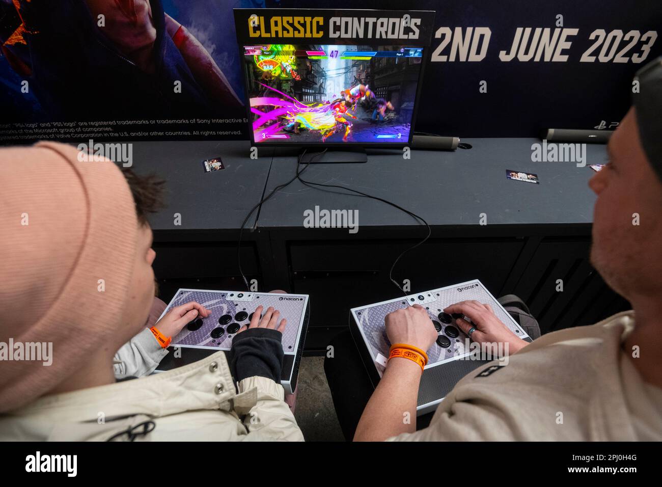 London, UK. 30 March 2023. Visitors play the upcoming 'Street Fighter 6 ...