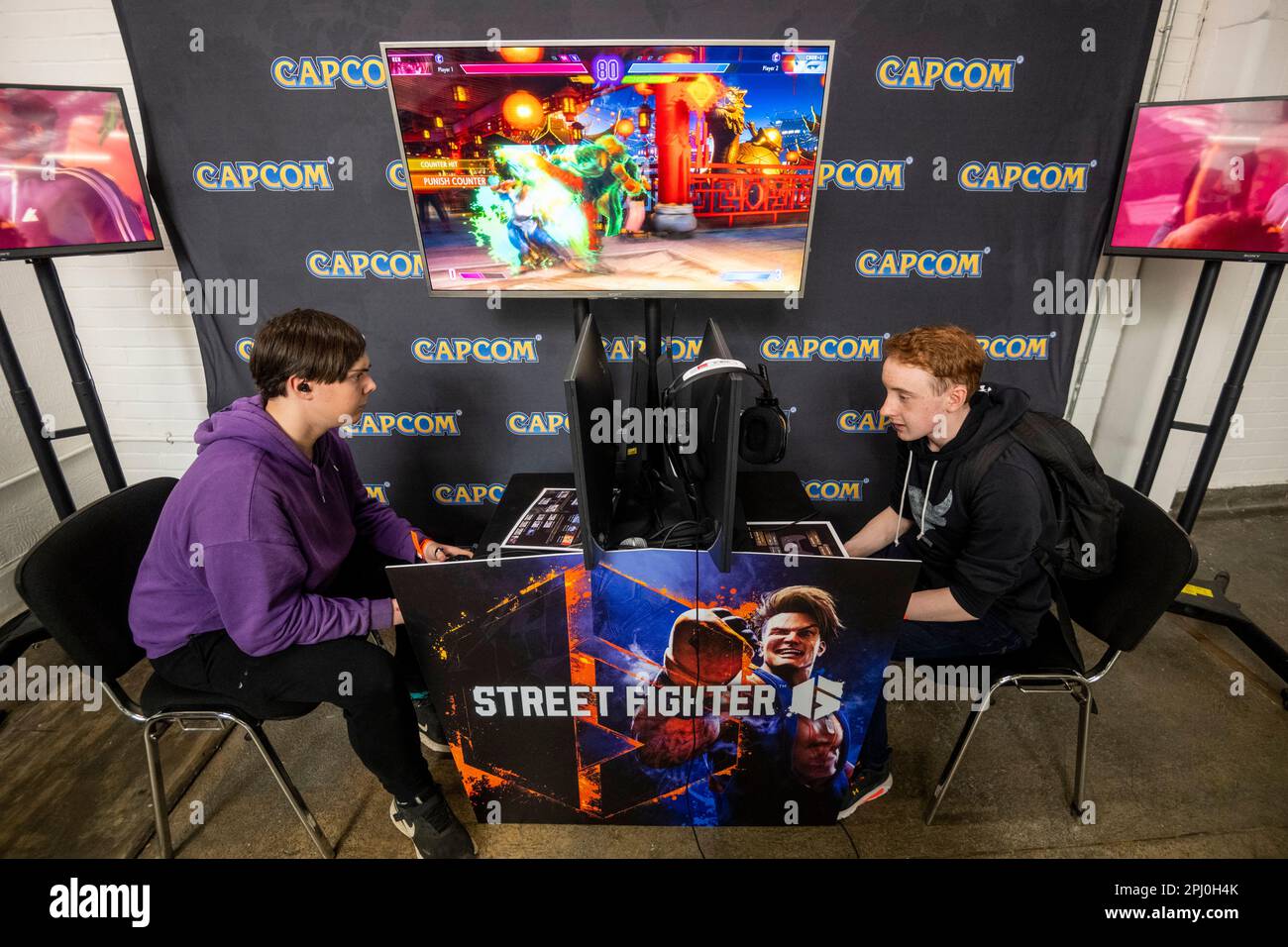 London, UK. 30 March 2023. Visitors play the 'Street Fighter 6' by at the W.A.S