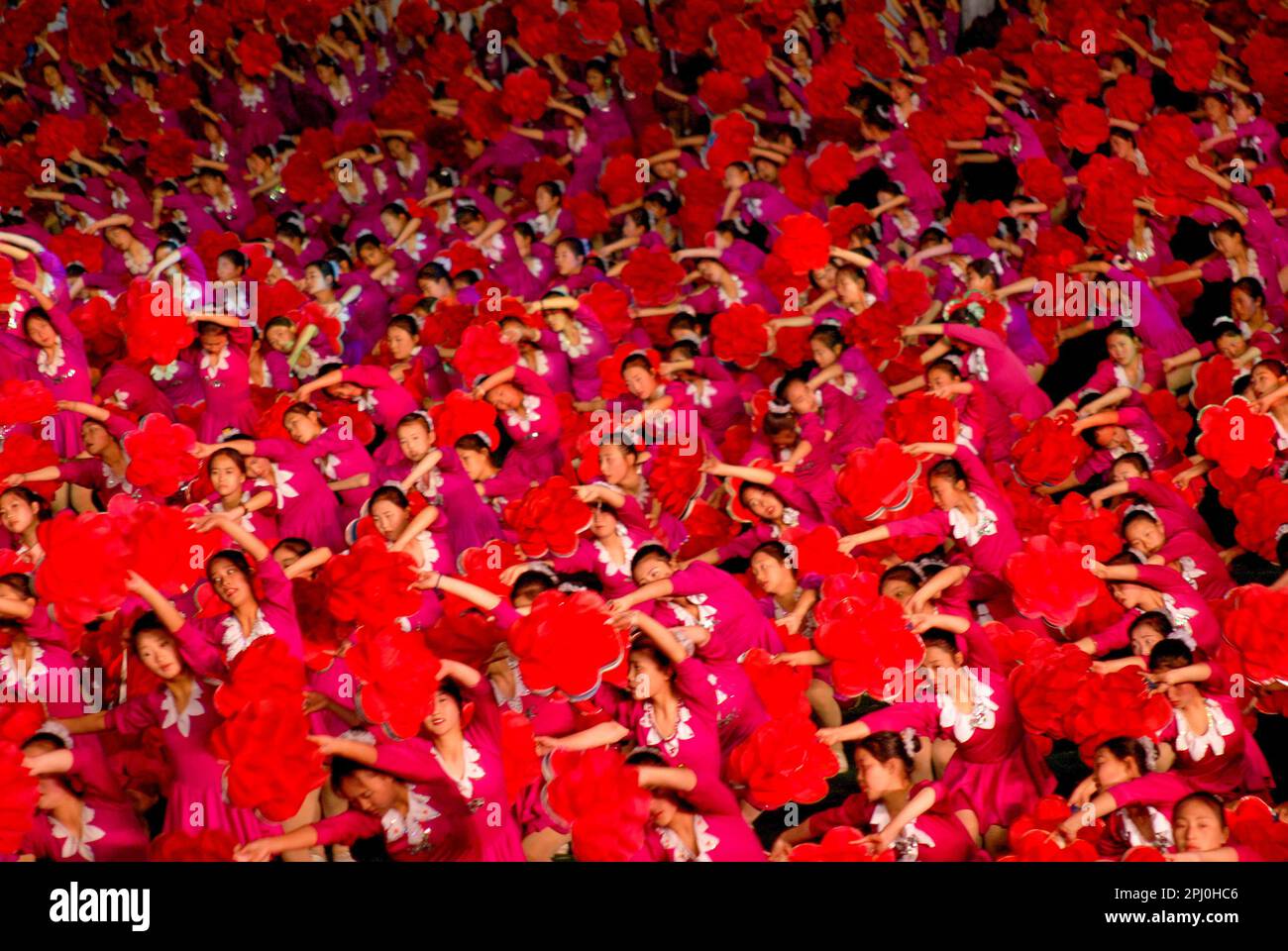 North Korea's Mass Games is a synchronised propaganda spectacle featuring up to 100,000 gymnasts, dancers, acrobats and martial artists. Stock Photo