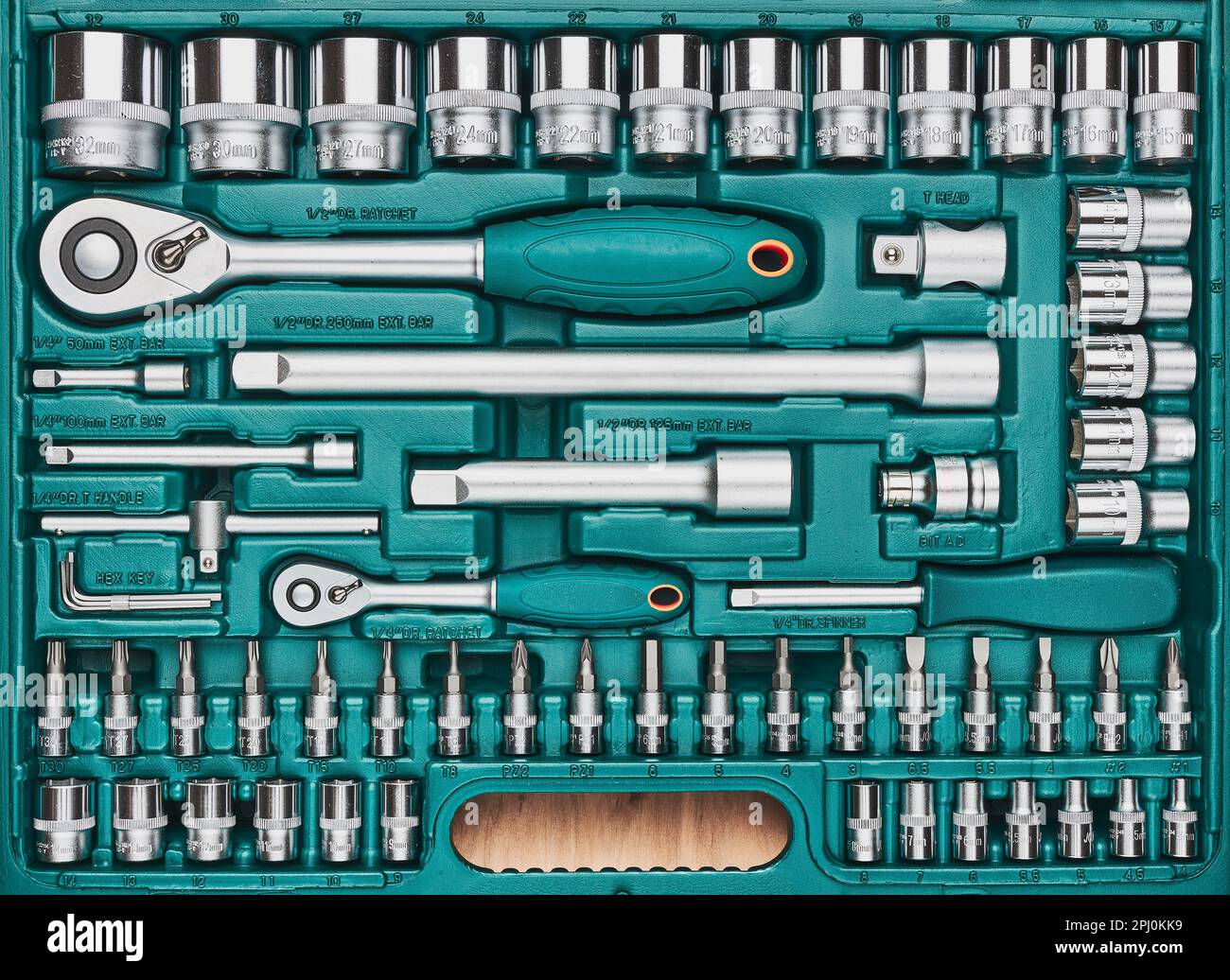 Ratchet with many attachments in plastic case. Work tools. Universal