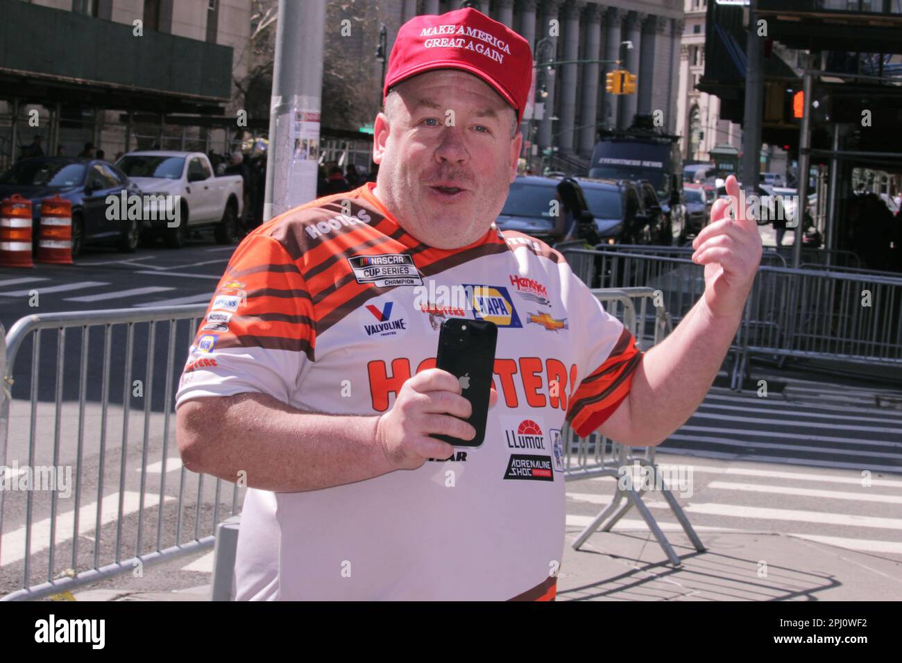 New York, NY, USA. 27th Mar, 2023. A man wearing a MAGA Make America Great Again hat taunts the media outside 100 Centre St. in NYC prior to a possible indictment of Donald Trump. March 27, 2023. (Credit Image: © John Marshall Mantel/ZUMA Press Wire) EDITORIAL USAGE ONLY! Not for Commercial USAGE! Stock Photo