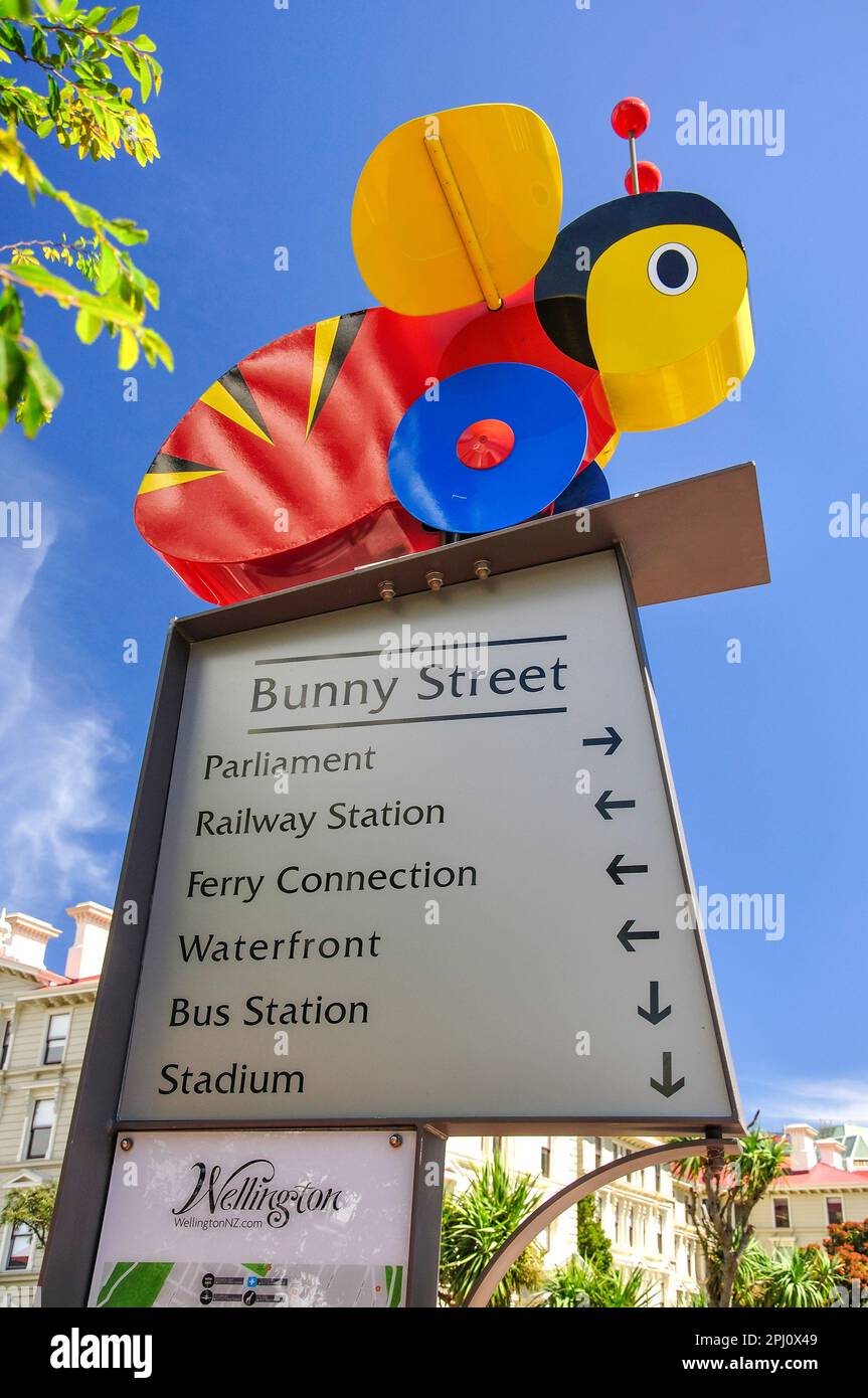 Street sign with 'Buzy Bee' logo, Bunny Street, Wellington, Wellington Region, North Island, New Zealand Stock Photo