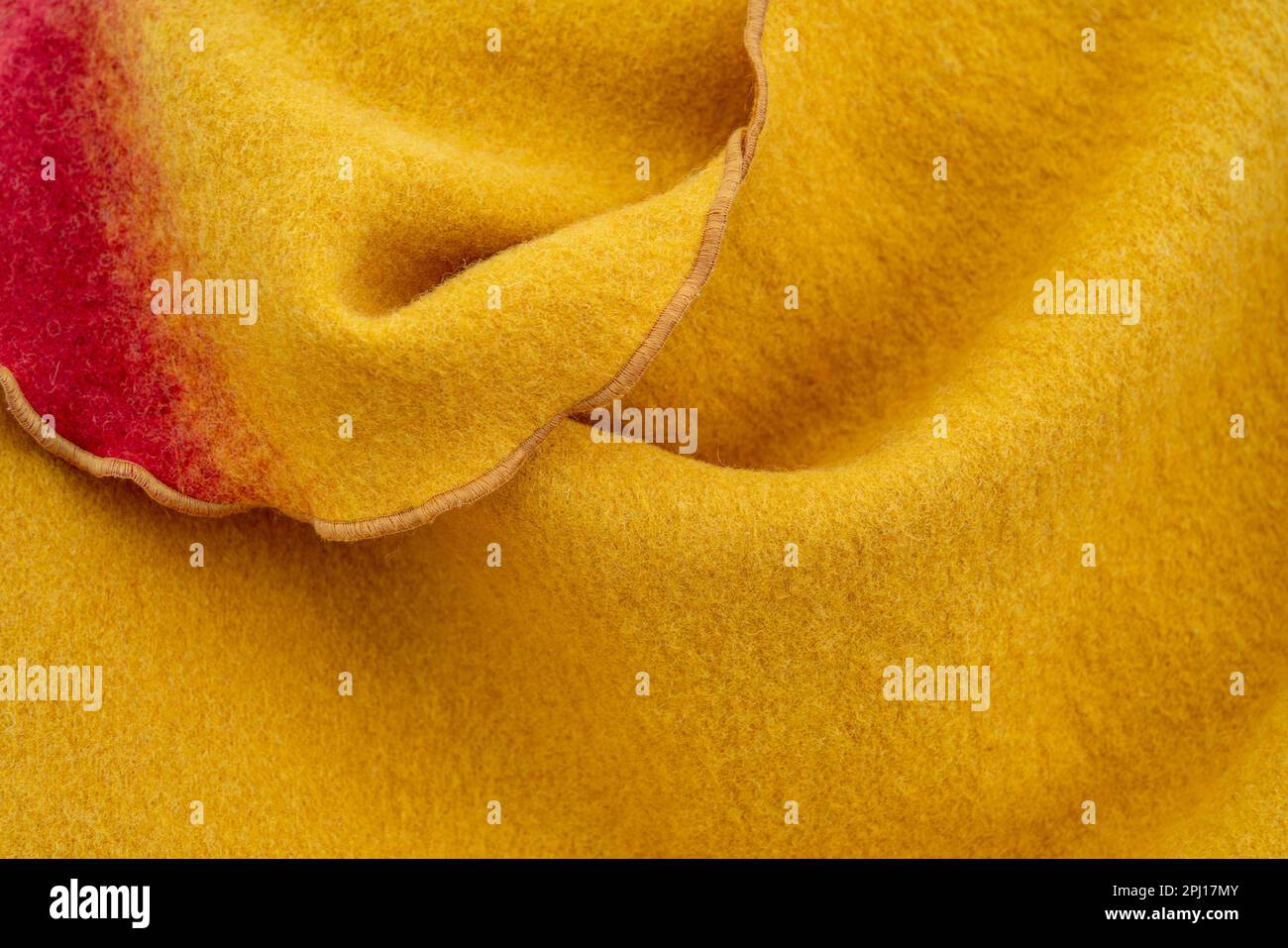 Mostly yellow full frame felt fabrics closeup shot Stock Photo