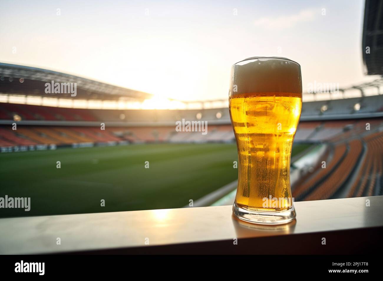 Glass of beer on football stadium background Stock Photo Alamy
