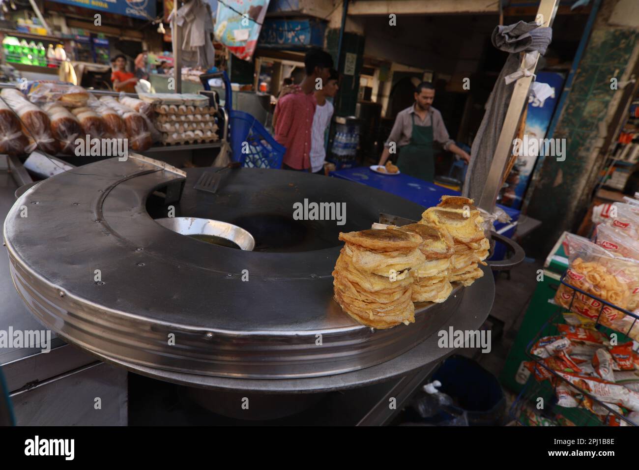 Burns Road march 2021, A young man making Bun Kebab at famous and old