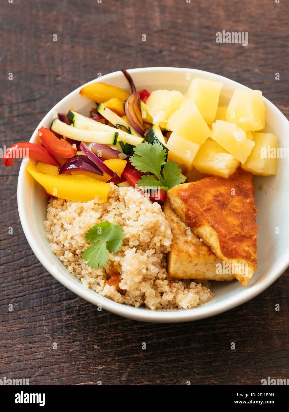 Hawaiian Barbecued Tempeh Bowl with quinoa, tempeh, bell peppers